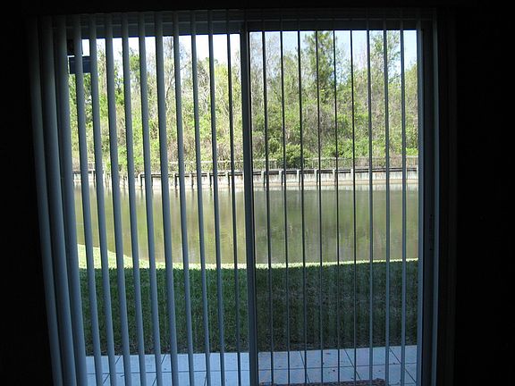 Lake and woodlands beyond #2 : View from living room.