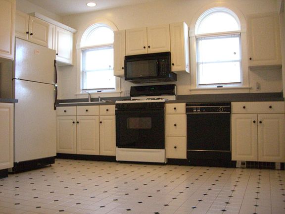 Eat-in kitchen with lots of cabinets