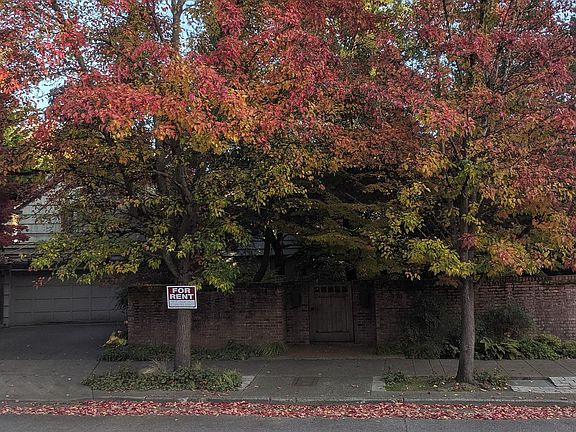Street View. Home has brick wall with lockable gates. Foliage privacy buffer.