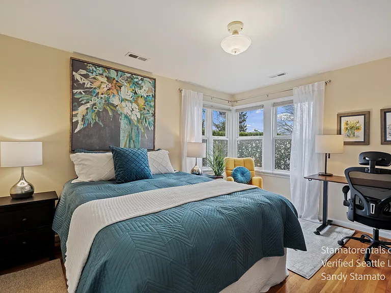 The Broadview Bedroom features a premium queen Saatva Latex Hybrid mattress, dedicated sit-stand workspace, and abundant natural light.