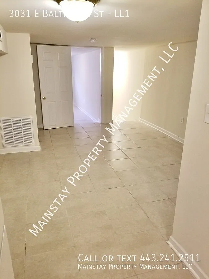 1 Bedroom Condo in Patterson Park - Utilities Included! — Photo 2
