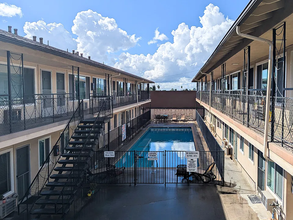 Central pool, sunny vibes, and summer fun steps from your door