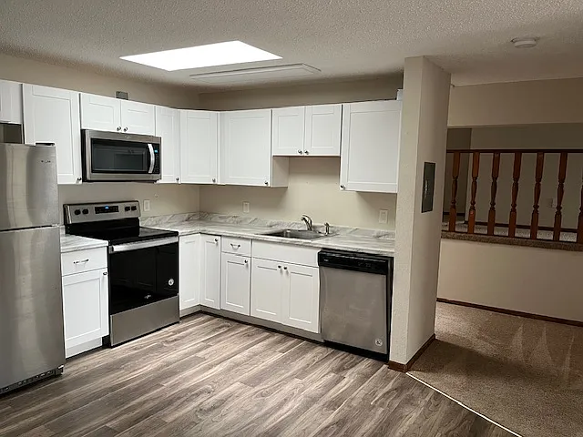 123 S Rum River Dr #E — Photo 2