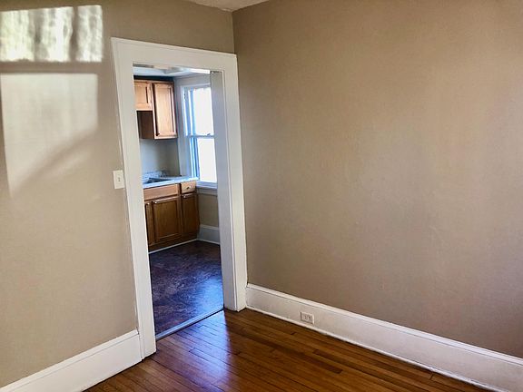 Dining room looking into kitchen.