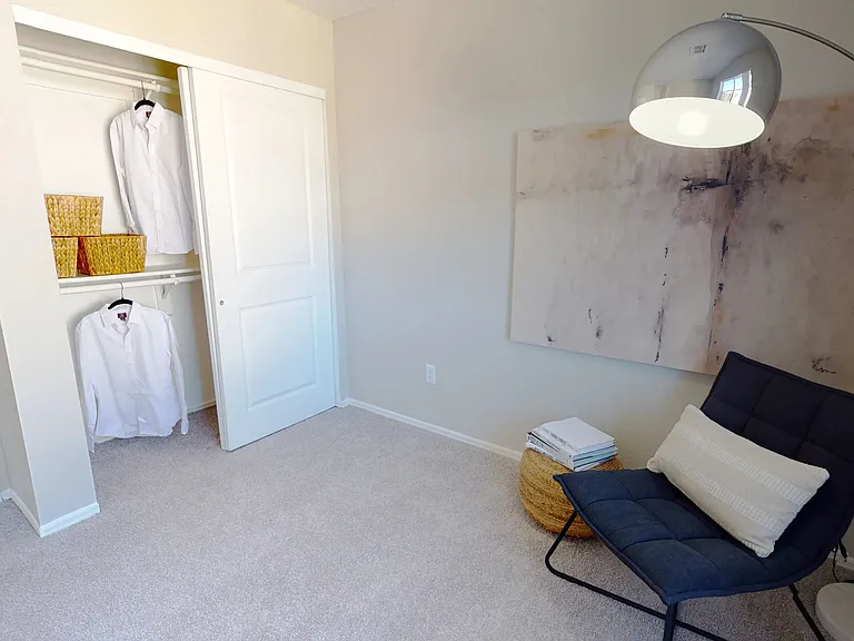 Our guest bedrooms boast ample space with whispers of organization and style.