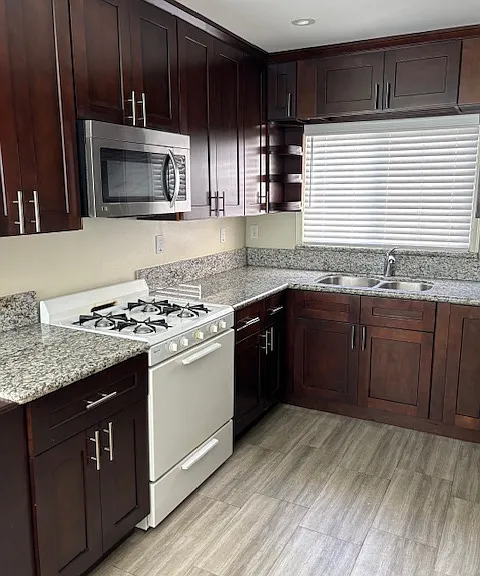 Bright kitchen with granite countertops