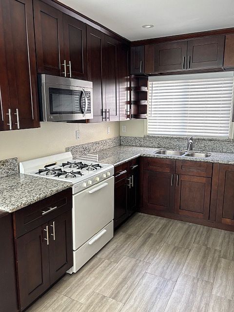 Bright kitchen with granite countertops