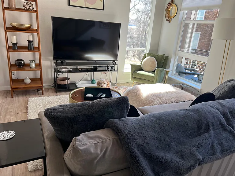Living room area w/ access to patio (great place to enjoy coffee in the morning).