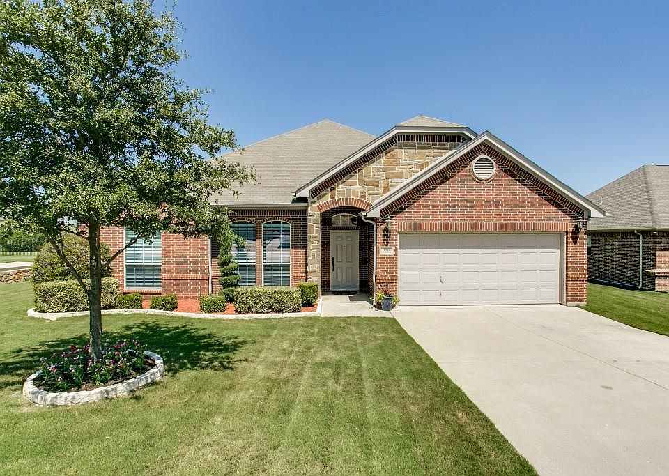 Welcome to 10916 Swift Current Trail in Lago Vista at Bonds Ranch!