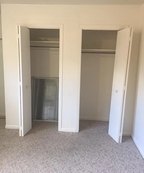 room with 2 closets