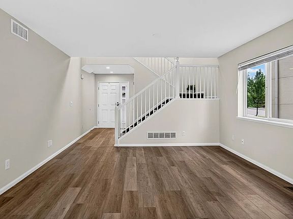 New flooring throughout, freshly painted. New appliances, New light fixtures.