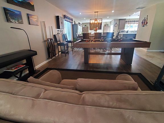 View of living room, dining room and family room from front door