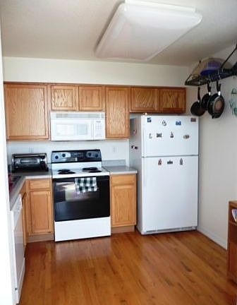 Kitchen with hardwood flooring