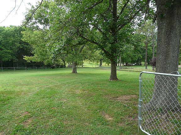 Oversized, level fenced in