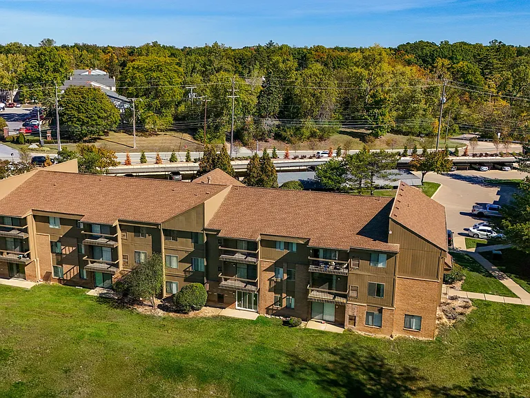 Expansive Green Space Apartment Building Exterior at Franklin River Apartments, Southfield, MI