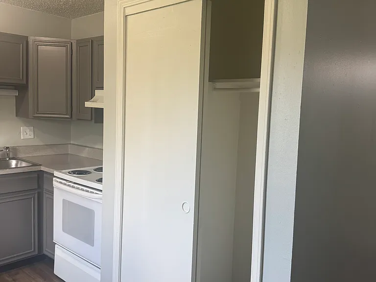 Kitchen features closet area