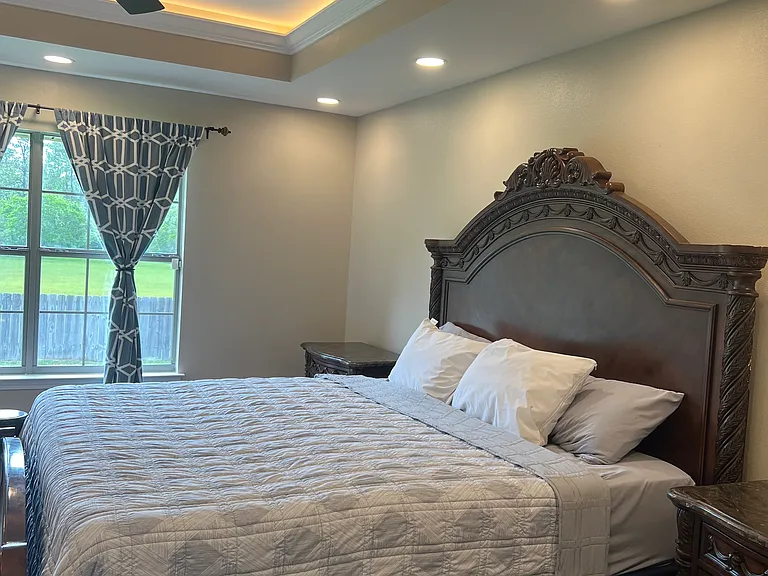 Owner Suite Bedroom with recess, lighting, as well as a coffered lighting in the Crawford ceiling