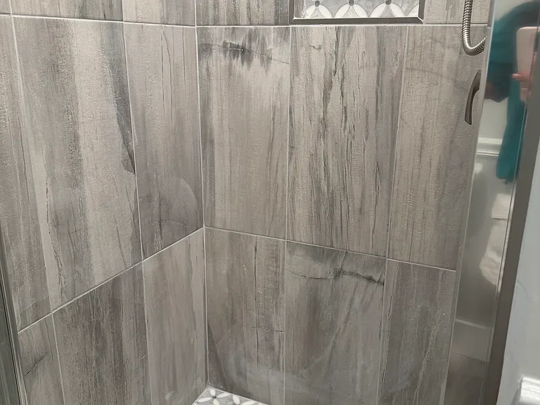Newly built shower in the recently renovated full bathroom