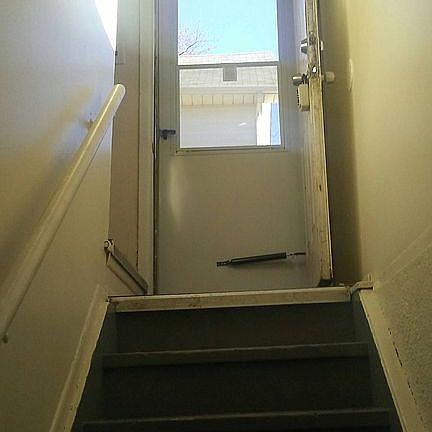 Steps from basement to side 