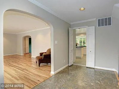 Foyer into Living Room (left) and Kitchen (right)