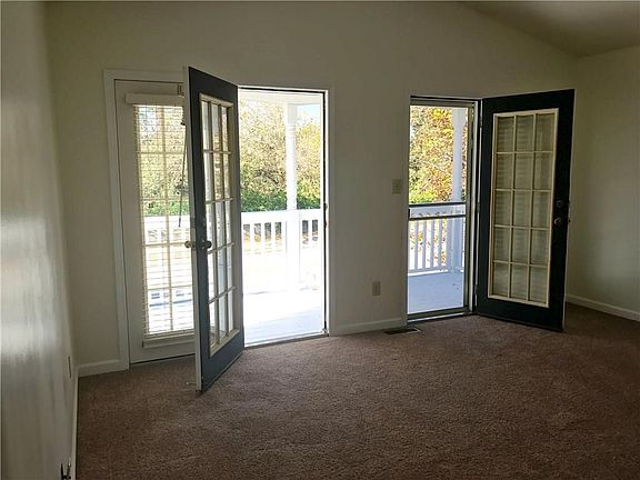 Master bedroom features double door to private deck!