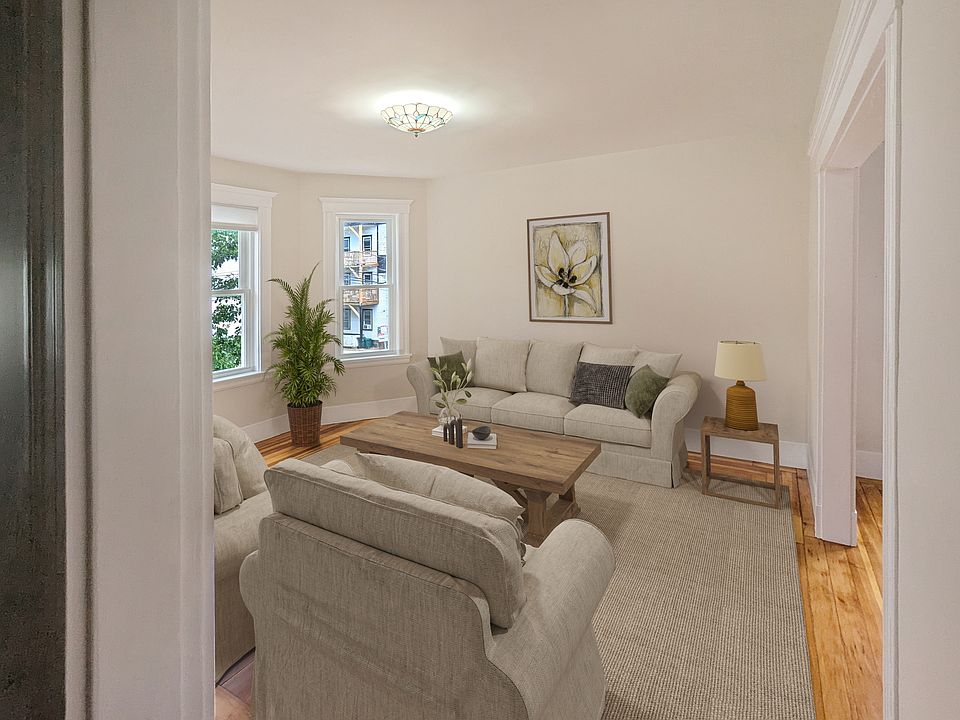 Living room with bay windows