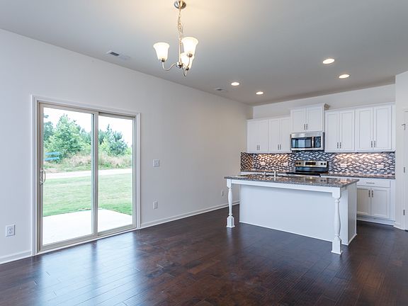 Island is faces left wall on actual plan.