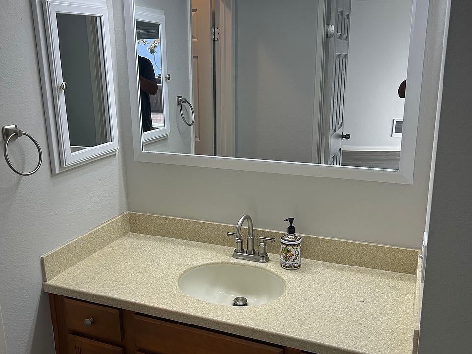 Vanity with new medicine cabinet and mirror.