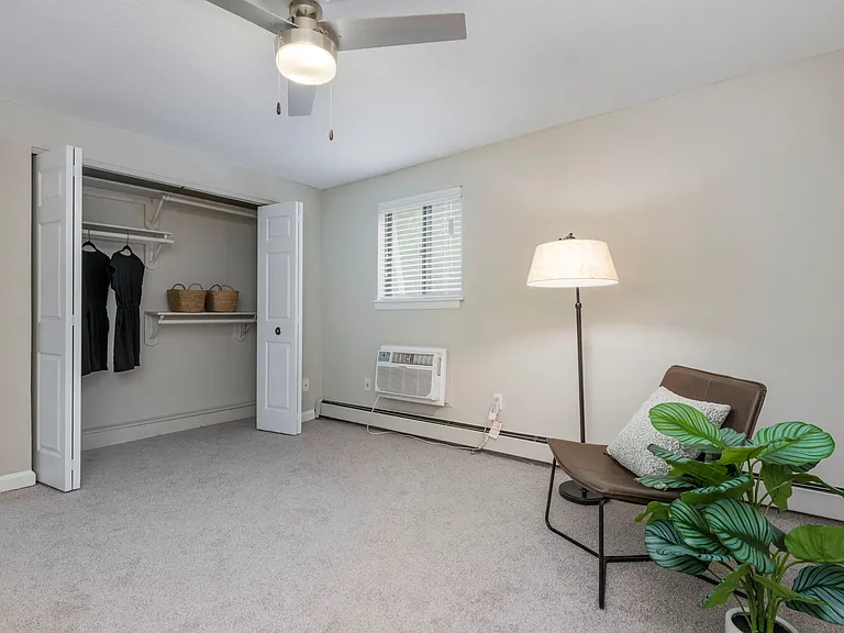 Closet organizers in our bedrooms provide spacious and organized wardrobe storage with double bi-fold doors and solid wood shelving to maximize your closet options.
