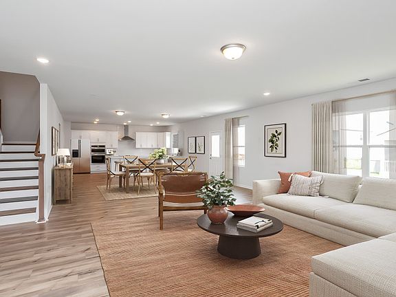 Open floorplan that connects the Gathering Room to the Cafe and Kitchen.