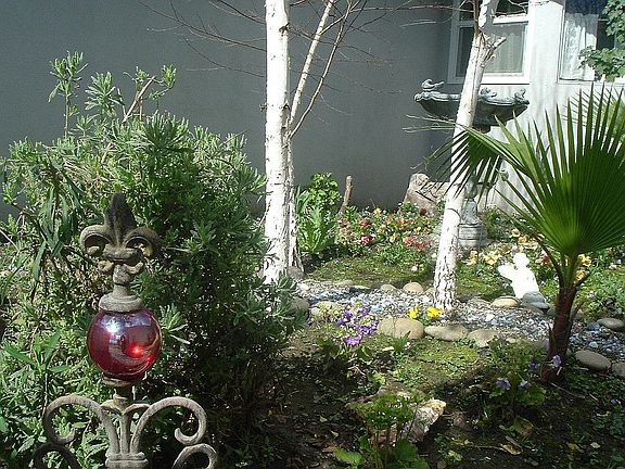 inside courtyard, leading up to front double doors