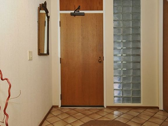 Entry with tile floor