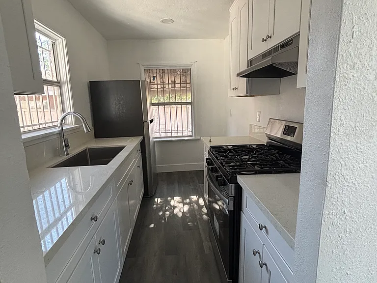 KITCHEN VIEW FROM HALLWAY