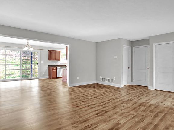 Open living room, dining and kitchen