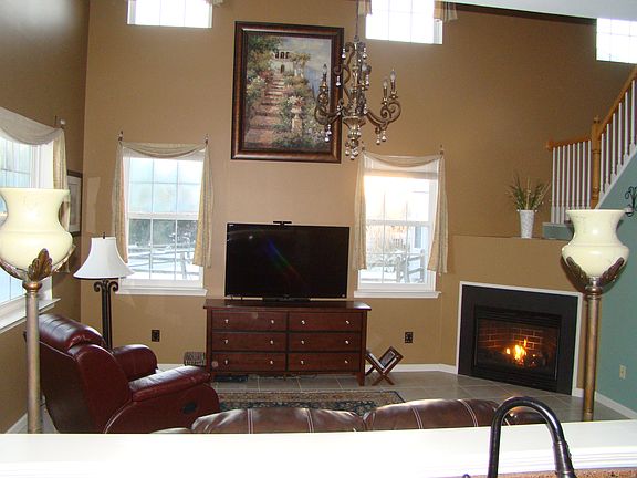 Family Room w/ 2 story ceil.