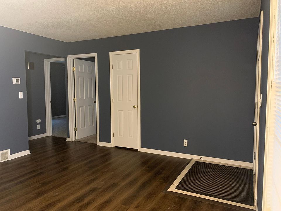 Front door entrance into living room.