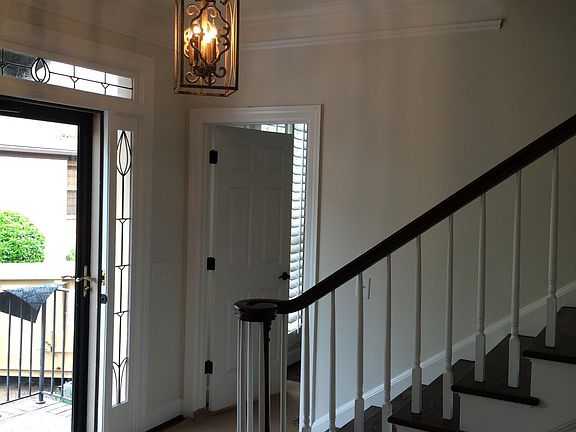 Entryway. Door to downstairs bedroom.
