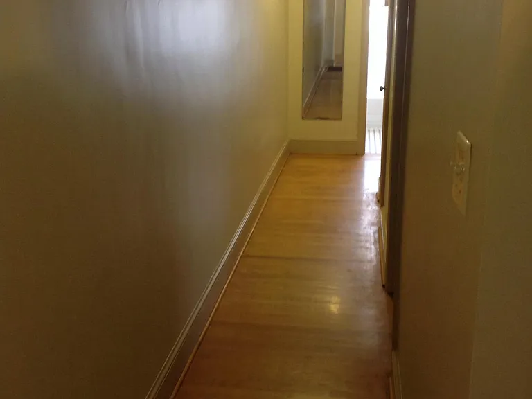 Hallway to bathroom & bedrooms