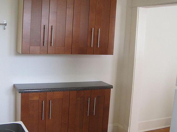 recent cabinets and counter in kitchen