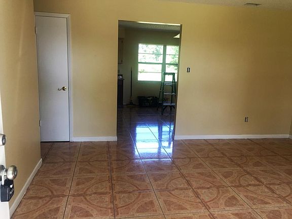 Living Room with view into the kitchen