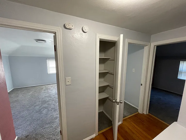 Towel closet in hallway