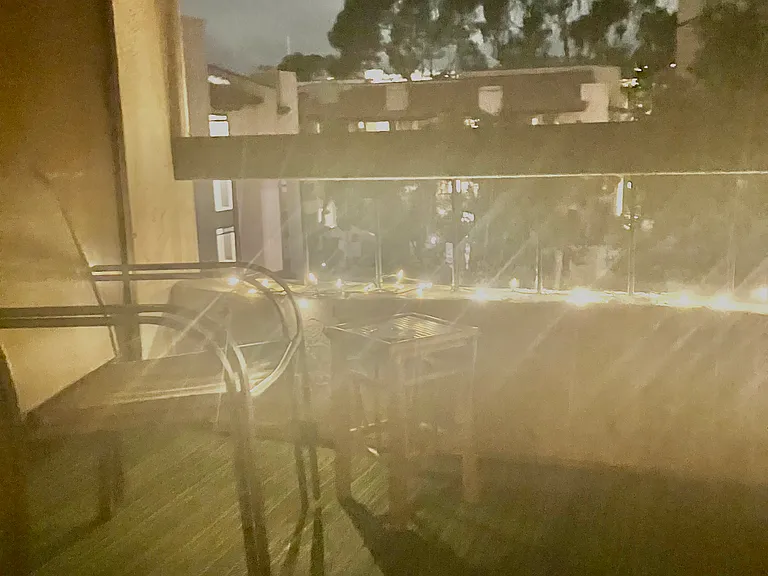 balcony sitting area with lighting