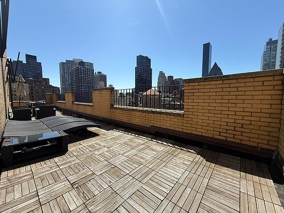 2nd image of 310 E 55th St #Penthouse 2