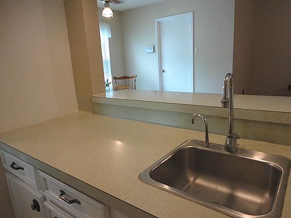 Wet bar and butlers pantry opens to living area - double duty for the best in contemporary entertaining.