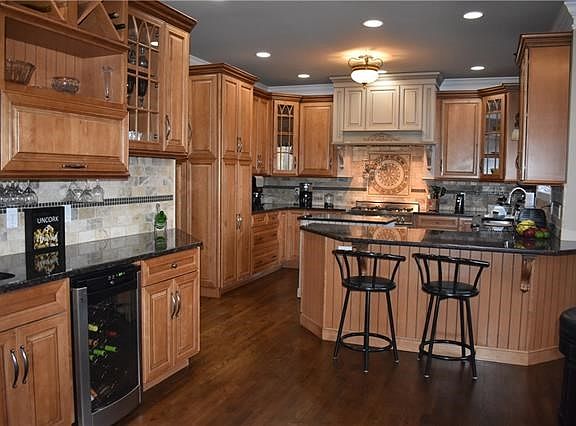 Fully renovated kitchen.  Butler station with wine fridge.  Top of the line custom cabinetry.