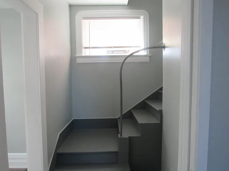 To the upstairs 3 bedrooms and 3/4 bath