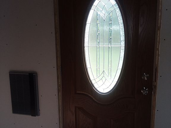 Wall heater and front door