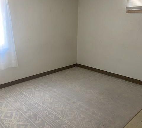 Bedroom with safety egress window.