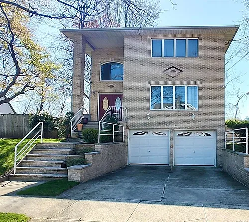 242-34 54th Ave #1-2F Photo 1 242-34 54th Ave #1-2F Photo 1