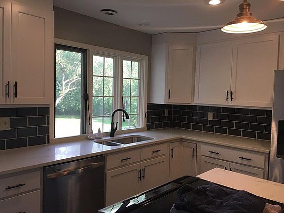 Kitchen with completed backsplash
